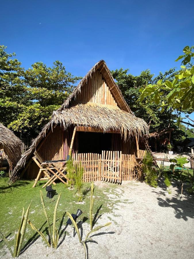 Tribal Huts Community Hostel Daanbantayan Buitenkant foto
