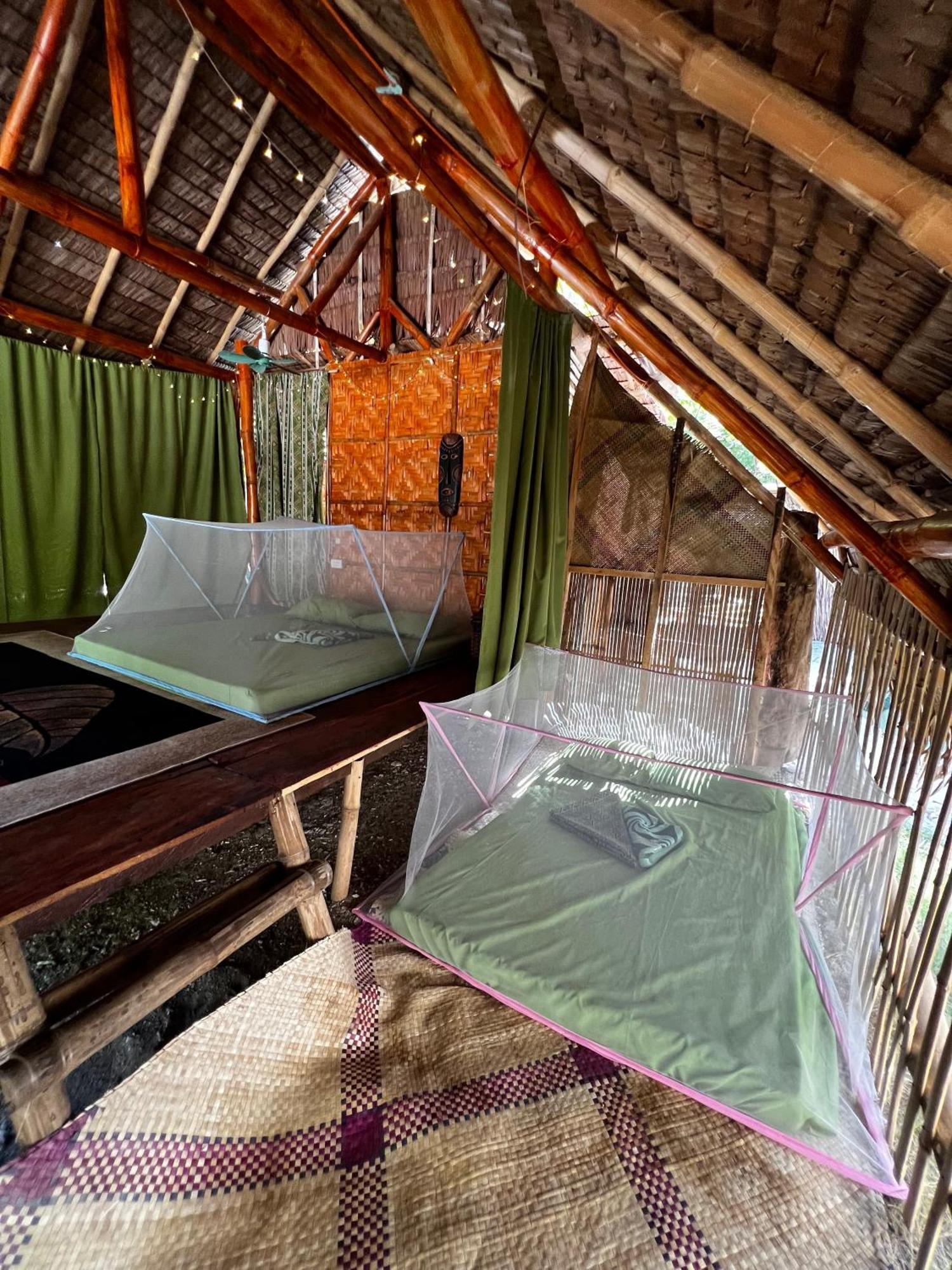 Tribal Huts Community Hostel Daanbantayan Buitenkant foto