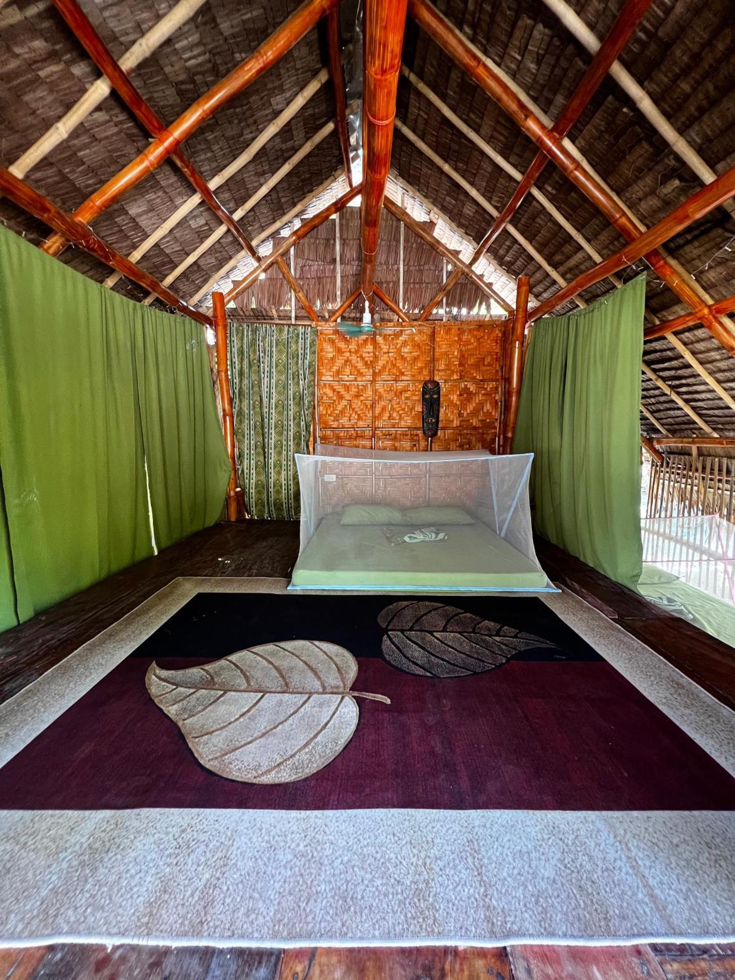 Tribal Huts Community Hostel Daanbantayan Buitenkant foto
